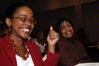 Jacqueline Taylor and Renee Jones enjoy the 2nd Annual Black History Month program. - Photo by Beth Spain