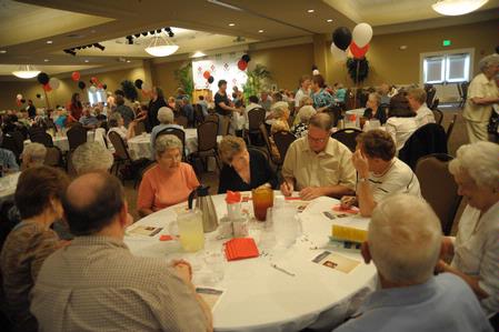 Guests at the Senior Adult Extravaganza enjoy some fun and fellowship in the Carl Grant Events Center.