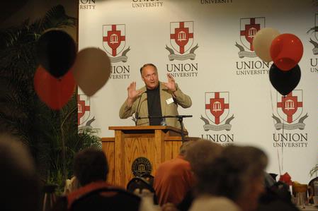 Dr. Jerry Tidwell, senior vice president for university relations, speaks to guest of the Senior Adult Extravaganza.