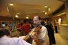 Hal Poe, Charles Colson Professor of Faith & Culture, provides a little pre-meal entertainment for faculty and staff at the Faculty/Staff dinner.  - Photo by Morris Abernathy