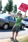 Cale Little, sophomore history major, greets incoming freshmen and their families on Move In Day for the fall 2010 semester. - Photo by Deanna Santangelo