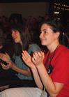 Abby Winters and Ahnna Reyes enjoy the fun acts in the new student Open Mic Night held at Barefoots Joe.  - Photo by Victoria Stargel