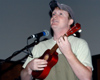 Brad Chad plays his ukulele for a crowd of students at Fall Fest 2003. - Photo by Jonathan Blair