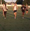 The men's cross country team practices for the fall season. - Photo by Ebbie Davis