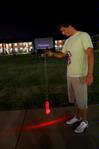 Aaron Davidson, junior SAC member, plays with one of the yo-yos that were given to students at the Movie on the Lawn.  - Photo by Ebbie Davis
