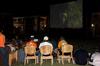 Students enjoy the movie "How to Train Your Dragon" at Movie on the Lawn, presented by SAC.  - Photo by Ebbie Davis