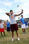 The men of Watters Residence Complex compete in the archery contest during the Watters Great Outdoors event. - Photo by Deanna Santangelo