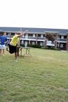 Justin Boggs, junior nursing major, competes in the log toss competition for his team during the Watters Great Outdoors event.
 - Photo by Deanna Santangelo