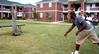 Shane Burrell, junior sports management major, represents his team during the hatchet throwing competition at the Watters Great Outdoors event. - Photo by Deanna Santangelo