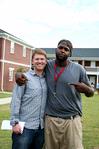 Shane Burrell, junior sports management major, poses with Luke Pruett, residence director, at the Watters Great Outdoors event. - Photo by Deanna Santangelo