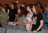 Katherine Crutcher, Kristen Marks, and Michele Marks enjoy a time of worship during chapel. - Photo by Ebbie Davis