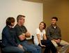 Paul and Janet Jackson answer a question asked by one of the students at Go Week: Reaching the Nations through Adoption. Mark Campbell and his wife Molly listen. - Photo by Deanna Santangelo