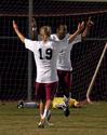 William Hanna (19) and Diego Santos celebrate a goal. - Photo by Meagan Comeaux