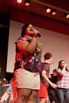 For All-Sing the group "On Holidays" performs songs under all about summertime. Elicia Mathis, senior psychology major, sings a solo. - Photo by Deanna Santangelo