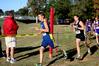 10/275/10 - Joel Wellum, senior political science major, rounds a corner in a cross country race. 