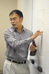 Kevin Chen, assistant professor of Biblical studies, instructs students in class.  - Photo by Morris Abernathy