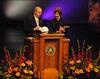 10/19/10 - David S. Dockery, president of Union University, presents Laura Bush, former first lady of the United States, with gifts bearing significance to Union. Dockery presented a study Bible, to which several Union faculty contributed, and a Lady Bulldogs baseball cap, representing Union's national title in women's basketball.