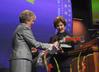 10/19/10 - Lanese Dockery, first lady of Union University, thanks Laura Bush, former first lady of the United States, for speaking at the 13th annual Scholarship Banquet and presents her with roses. 