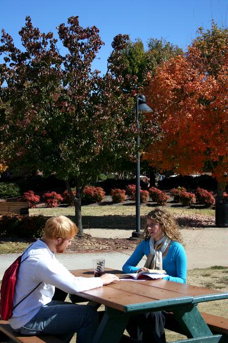 Josh Smith, senior conservation biology major, and Charlotte Cline, senior applied linguistics major, enjoy the gorgeous Fall weather on campus. 