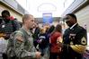 Aaron Rowland, sophomore DMS major, talks with the representative from the National Guard during Career U.  - Photo by Deanna Santangelo