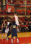 11/6/10 - Stan McNeil jumps over his Truett-McConnell College opponents to score in the homecoming game. 