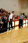 Mark Campbell, head women's basketball coach, calls out plays during the homecoming game against University of St. Francis. - Photo by Deanna Santangelo