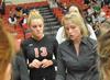 10/28/10 - Kelly Elliott, head coach, talks to Caroline Robbins and the rest of the Lady Bulldog volleyball team during a timeout.