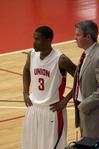 11/320/10 - C.J. Davis and David Niven, head men's basketball coach, discuss a play on the sidelines during a game against Life University. 