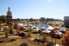 Union's Great Lawn is filled with people enjoying various homecoming activities including Arts in the Park and Tailgating.  - Photo by Ebbie Davis