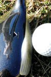 10/2/03 - Freshman Chase Whitby focuses on hitting a long drive down the fairway.