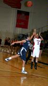 11/324/10 - LaTesa McLaughlin shoots a three-pointer during the game against Vanguard University in the 17th Annual Jackson Rotary Classic.