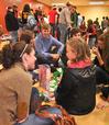 The Student Activities Council sponsors the annual Carl Perkins Christmas Party. Union students Hannah Strickland, Kylie McDonald, Karl Magnuson, and the rest of their group give Christmas gifts to a special child. - Photo by Victoria Stargel