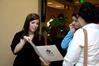 Sarah Brooks, enrollment counselor, explains the welcome packet to a prospective student during a preview day. - Photo by Deanna Santangelo
