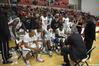 Coach David Niven talks to players in the final moments of their game against Bethel University, which the Bulldogs won by only one shot, 77-75.   - Photo by Morris Abernathy
