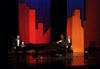 Dr. Terry McRoberts and Dr. David Dennis accept applause for their performance at the beginning of the evening for the 2003 Scholarship Banquet featuring former New York City Mayor Rudolph Giuliani. - Photo by Jim Veneman