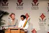 Zachary Pendergrass, coordinator of career planning and development, reads a Bible verse in English as Mikias Seid, senior intercultural studies and computer science major, reads the same verse in Amharic at the 4th Annual Black History Month Program. - Photo by Deanna Santangelo