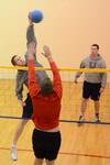 Students play intramural wall ball in the racquetball courts.  - Photo by Beth Spain