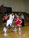02/52/11 - CJ Davis runs the ball down the court during the game against Lyon College.