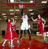 02/21/11 - Shane Burrell grabs a rebound during the game against Lyon College.