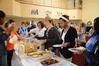 Students fill their plates at the Presidents Day welcome back breakfast, sponsored by Residence Life. - Photo by Abigail Harris