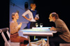 Miranda Wallace as Millie Stardard addresses Patrick Myers as Marvin Standard while Molly Williams waits on them as Cassandra Hooper in <i>You Have To Serve Somebody</i>. - Photo by Jim Veneman