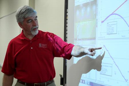 Bill Nettles, professor of physics and department chair, teaches with the new technology in the physics department. 