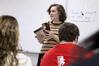 Janna Chance, assistant professor of English, discusses a William Blake poem with her students in class.  - Photo by Kristi McMurry