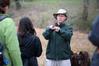 Andy Madison, associate professor of biology, shows his conservation biology students a leaf from a nearby tree during a field trip to the West TN Research & Education Center. - Photo by Kristi McMurry