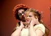 Jill Barron, sophomore theatre and speech major, grabs the face of Sarah Love, freshman Biblical studies major, during a performance of "The Winter's Tale" in the W.D. Powell Theatre. - Photo by Deanna Santangelo
