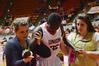 After an injury, Mildred Olumasi is assisted off the court with only a couple of minutes left in the first game of the NAIA National Championships. The Lady Bulldogs won the game 62-37. - Photo by Beth Spain