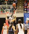 03/75/11 - Zeinab Chan goes up against her Avila University opponent at the start of the first game of the NAIA National Championship. The Lady Bulldogs won the game 62-37 and advanced to the next round. 