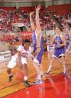 03/77/11 - Lavanda Ross goes around her Olivet Nazarene University opponent during game two of the NAIA National Championship. The Lady Bulldogs won 81-69 and advanced to the quarterfinals.