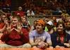 Joe Ball, Union alumnus, Shawn Chandler, senior Biblical languages major, and Abbie Johnson, senior at Trinity Christian Academy, cheer for the Lady Bulldogs during the quarterfinals of the NAIA National Championship. - Photo by Beth Spain