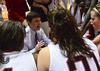 Mark Campbell, head coach, talks to the Lady Bulldogs during a time-out in the semifinals game of the NAIA National Championship. - Photo by Beth Spain